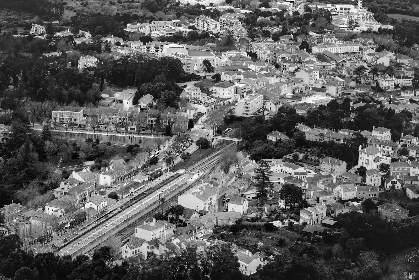 A hillside town and its train station seen from above. Photo by Jordan Ryskamp.